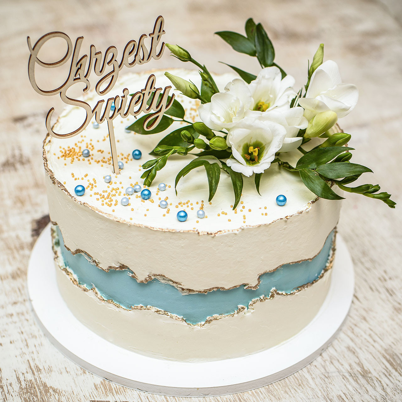 Tort błękitny fault line cake na chrzest